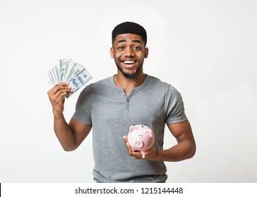 person saving money jar Saudi Arabia